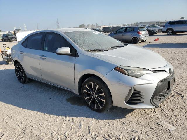 Photo 3 VIN: 5YFBURHE0JP854057 - TOYOTA COROLLA L 