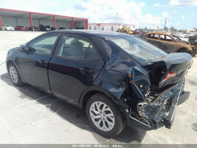 Photo 2 VIN: 5YFBURHE0KP856361 - TOYOTA COROLLA 