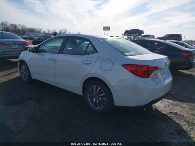 Photo 2 VIN: 5YFBURHE0KP857414 - TOYOTA COROLLA 