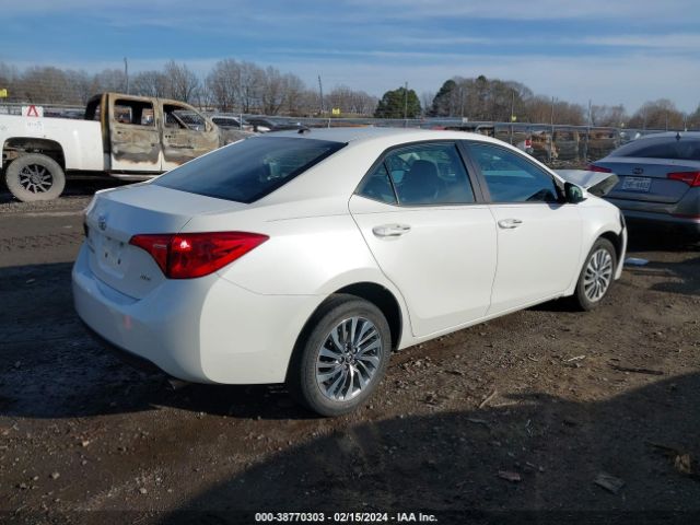 Photo 3 VIN: 5YFBURHE0KP857414 - TOYOTA COROLLA 