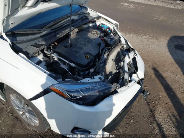 Photo 5 VIN: 5YFBURHE0KP857414 - TOYOTA COROLLA 