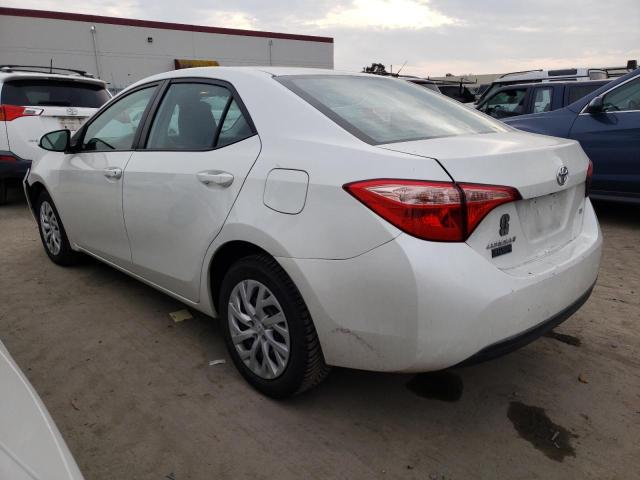 Photo 1 VIN: 5YFBURHE0KP858272 - TOYOTA COROLLA L 