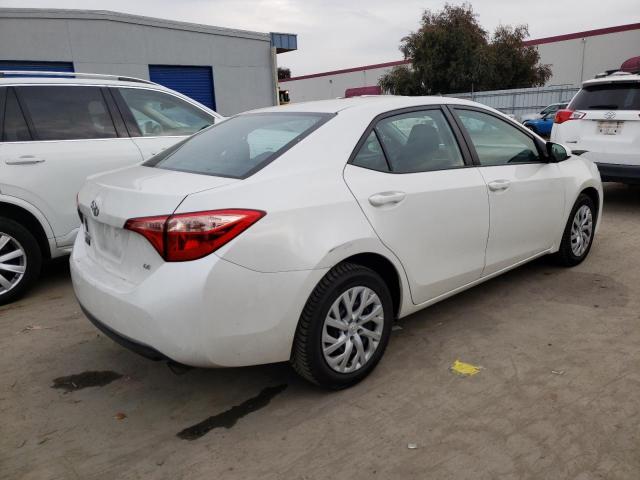 Photo 2 VIN: 5YFBURHE0KP858272 - TOYOTA COROLLA L 