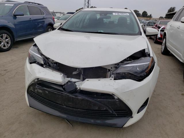 Photo 4 VIN: 5YFBURHE0KP858272 - TOYOTA COROLLA L 