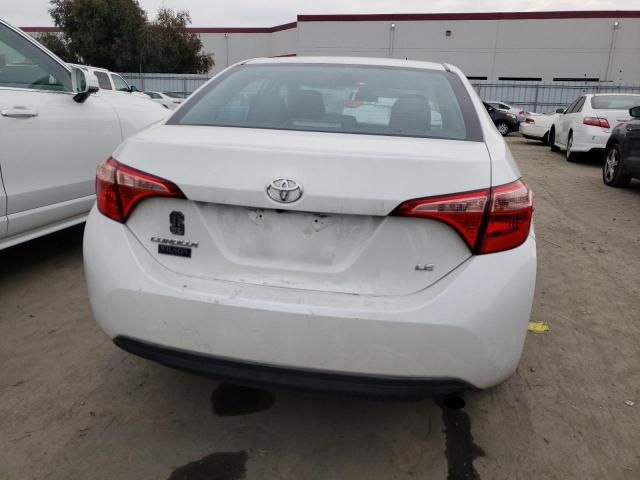 Photo 5 VIN: 5YFBURHE0KP858272 - TOYOTA COROLLA L 