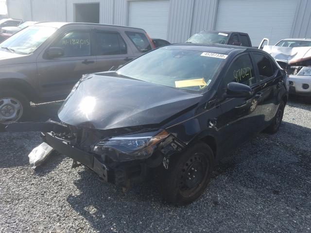 Photo 1 VIN: 5YFBURHE0KP859454 - TOYOTA COROLLA L 