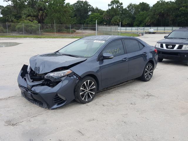 Photo 1 VIN: 5YFBURHE0KP863262 - TOYOTA COROLLA L 