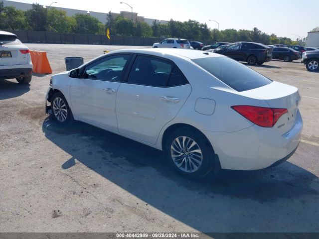 Photo 2 VIN: 5YFBURHE0KP868901 - TOYOTA COROLLA 