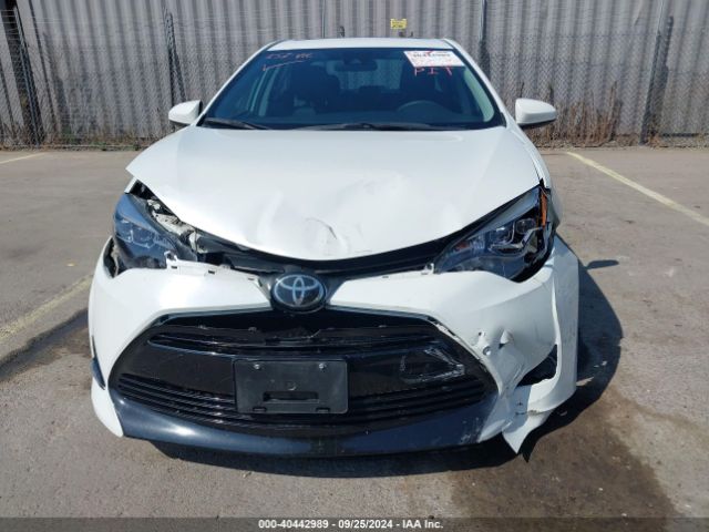 Photo 5 VIN: 5YFBURHE0KP868901 - TOYOTA COROLLA 