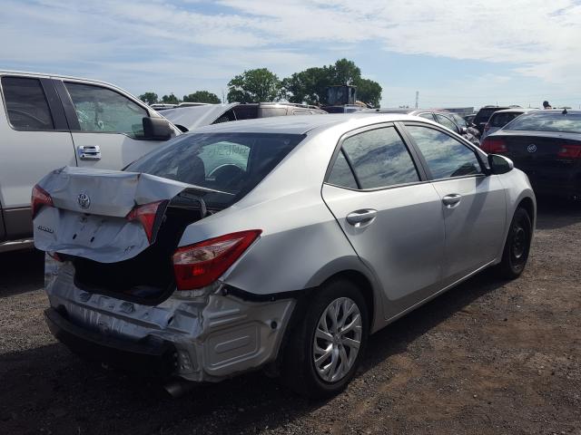 Photo 3 VIN: 5YFBURHE0KP870891 - TOYOTA COROLLA L 