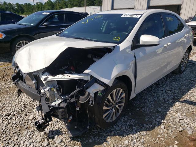 Photo 1 VIN: 5YFBURHE0KP872978 - TOYOTA COROLLA L 