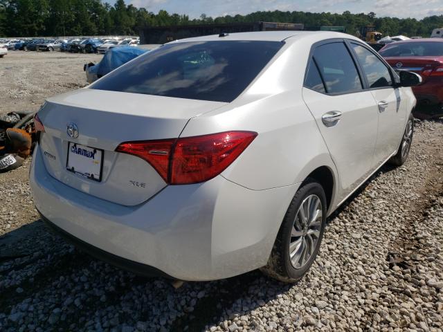 Photo 3 VIN: 5YFBURHE0KP872978 - TOYOTA COROLLA L 