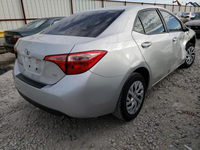 Photo 3 VIN: 5YFBURHE0KP876769 - TOYOTA COROLLA L 