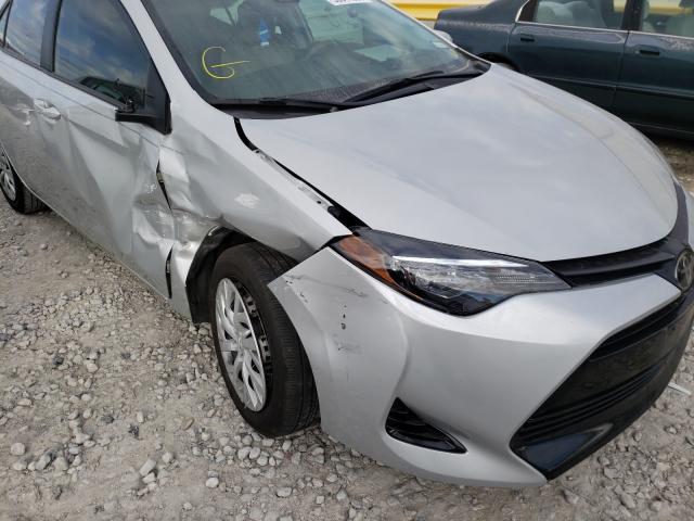 Photo 8 VIN: 5YFBURHE0KP876769 - TOYOTA COROLLA L 