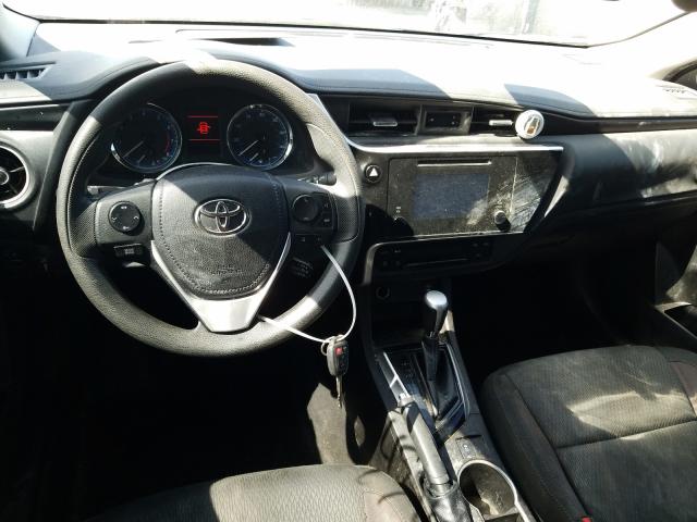 Photo 8 VIN: 5YFBURHE0KP879011 - TOYOTA COROLLA L 