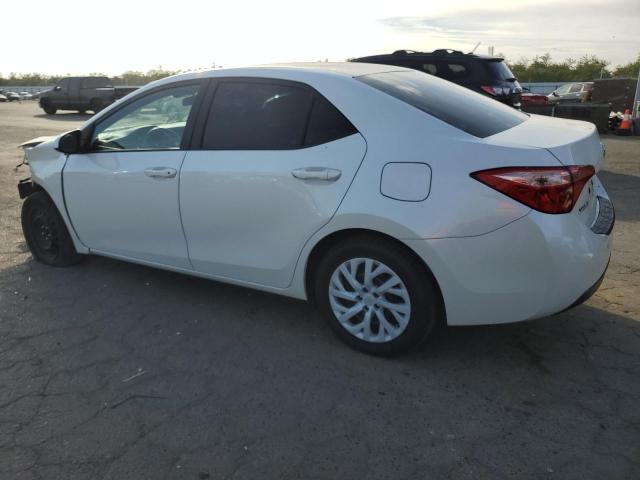 Photo 1 VIN: 5YFBURHE0KP882586 - TOYOTA COROLLA 