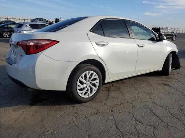 Photo 2 VIN: 5YFBURHE0KP882586 - TOYOTA COROLLA 