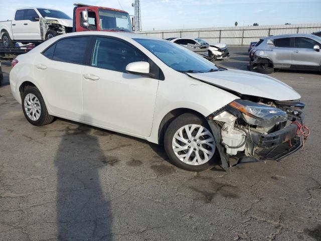 Photo 3 VIN: 5YFBURHE0KP882586 - TOYOTA COROLLA 