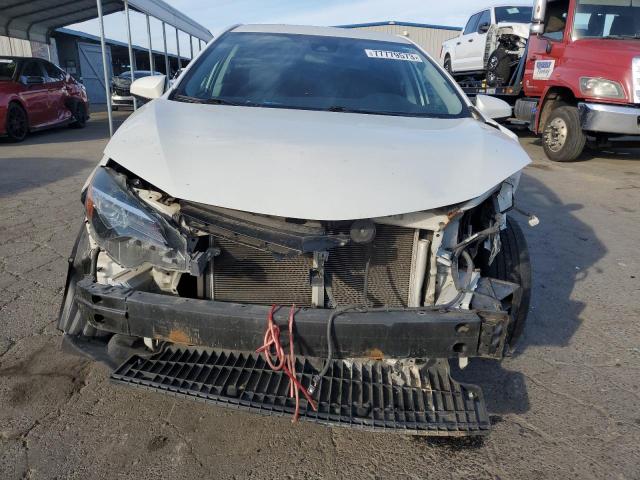 Photo 4 VIN: 5YFBURHE0KP882586 - TOYOTA COROLLA 