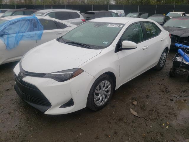 Photo 1 VIN: 5YFBURHE0KP888310 - TOYOTA COROLLA L 