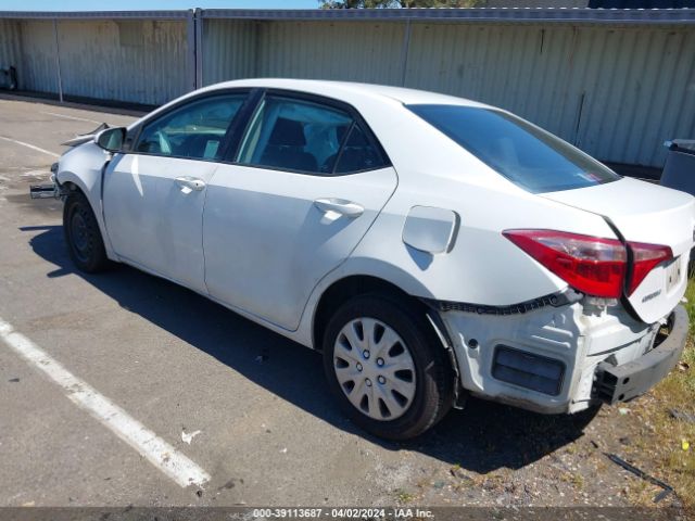 Photo 2 VIN: 5YFBURHE0KP889165 - TOYOTA COROLLA 