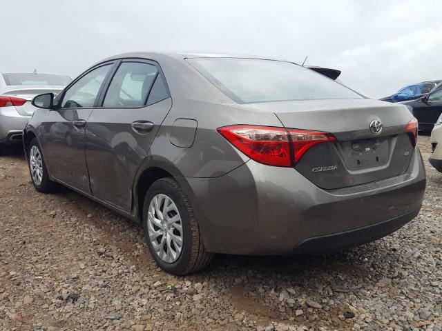 Photo 2 VIN: 5YFBURHE0KP889375 - TOYOTA COROLLA L 