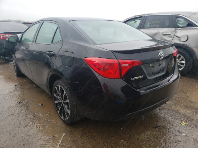 Photo 2 VIN: 5YFBURHE0KP890509 - TOYOTA COROLLA L 