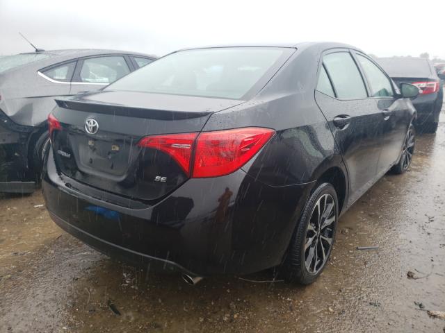 Photo 3 VIN: 5YFBURHE0KP890509 - TOYOTA COROLLA L 