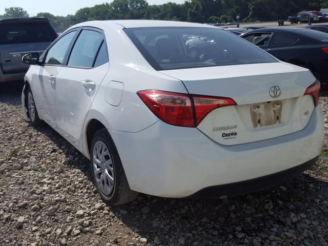 Photo 2 VIN: 5YFBURHE0KP890543 - TOYOTA COROLLA L 