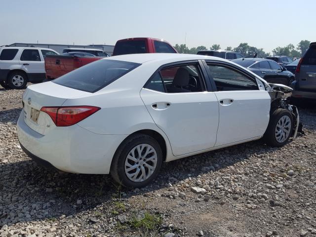 Photo 3 VIN: 5YFBURHE0KP890543 - TOYOTA COROLLA L 