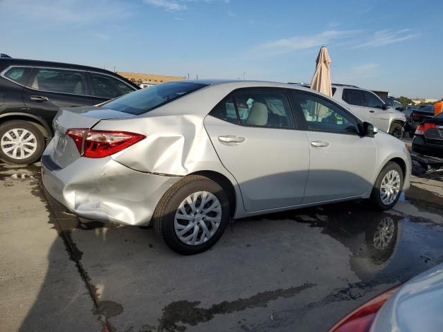 Photo 2 VIN: 5YFBURHE0KP891367 - TOYOTA COROLLA L 