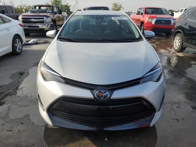 Photo 4 VIN: 5YFBURHE0KP891367 - TOYOTA COROLLA L 