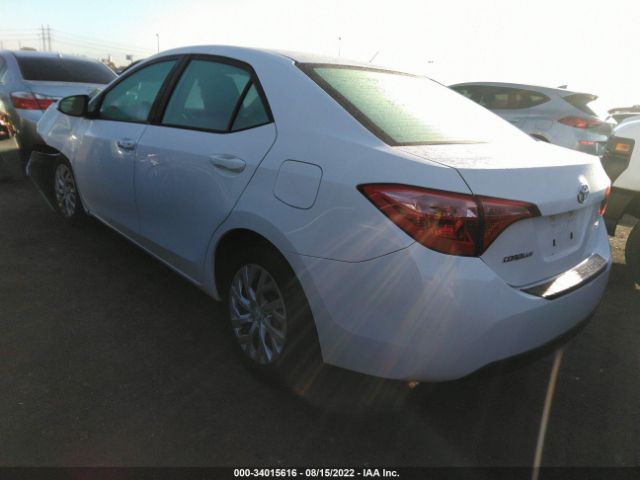 Photo 2 VIN: 5YFBURHE0KP893877 - TOYOTA COROLLA 