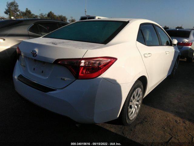 Photo 3 VIN: 5YFBURHE0KP893877 - TOYOTA COROLLA 