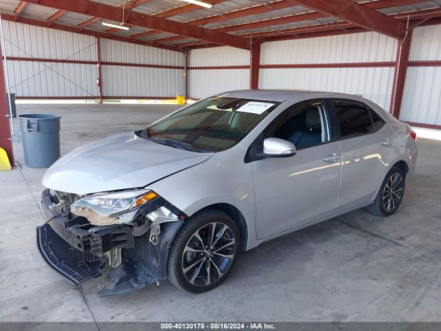 Photo 1 VIN: 5YFBURHE0KP894303 - TOYOTA COROLLA 