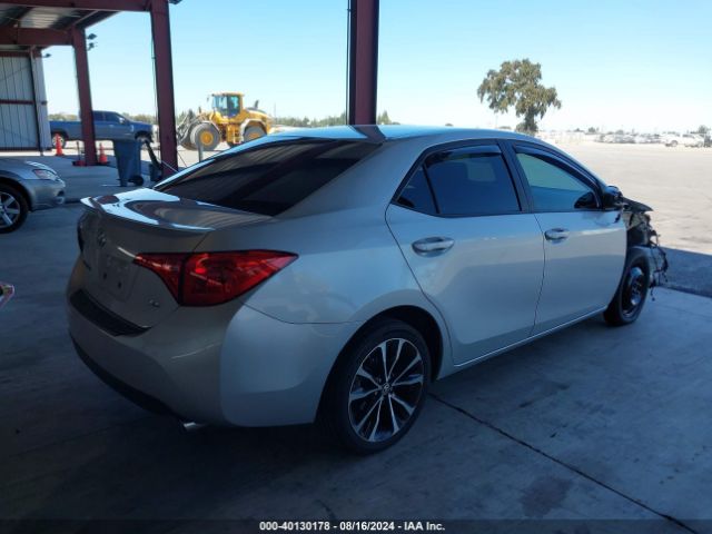 Photo 3 VIN: 5YFBURHE0KP894303 - TOYOTA COROLLA 