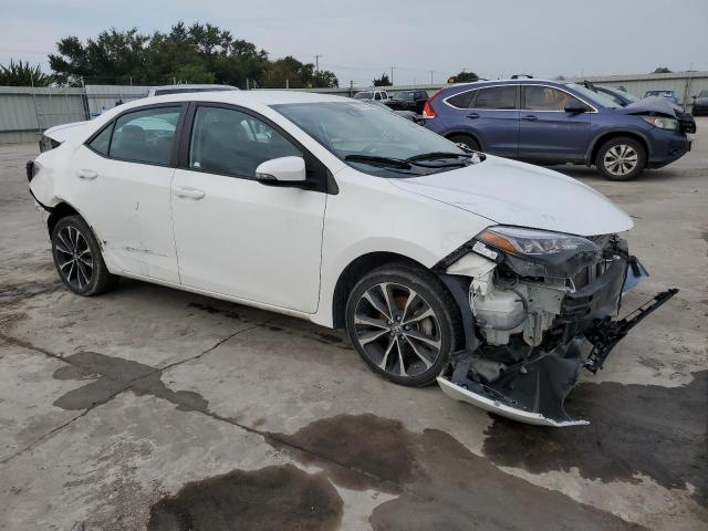 Photo 3 VIN: 5YFBURHE0KP894656 - TOYOTA COROLLA 