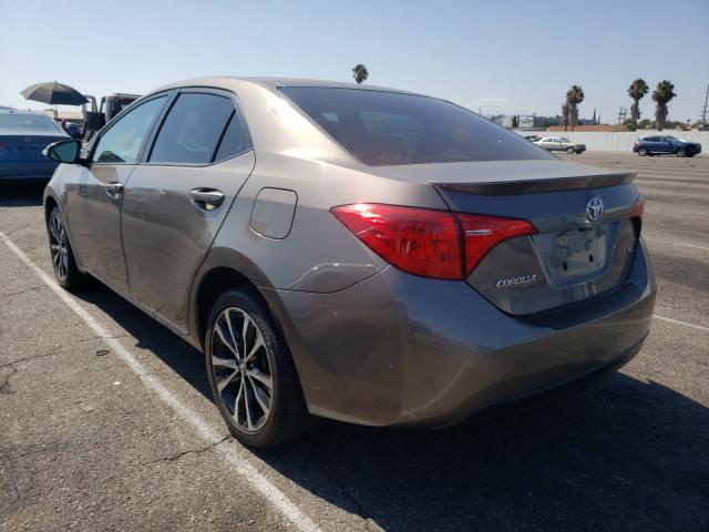 Photo 2 VIN: 5YFBURHE0KP894785 - TOYOTA COROLLA L 