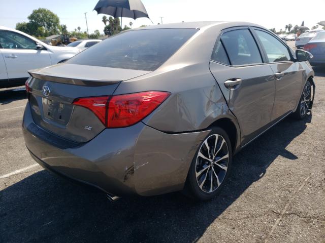 Photo 3 VIN: 5YFBURHE0KP894785 - TOYOTA COROLLA L 