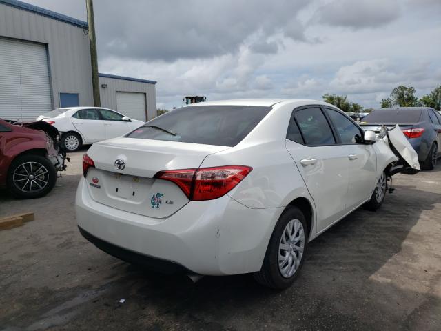 Photo 3 VIN: 5YFBURHE0KP897881 - TOYOTA COROLLA L 