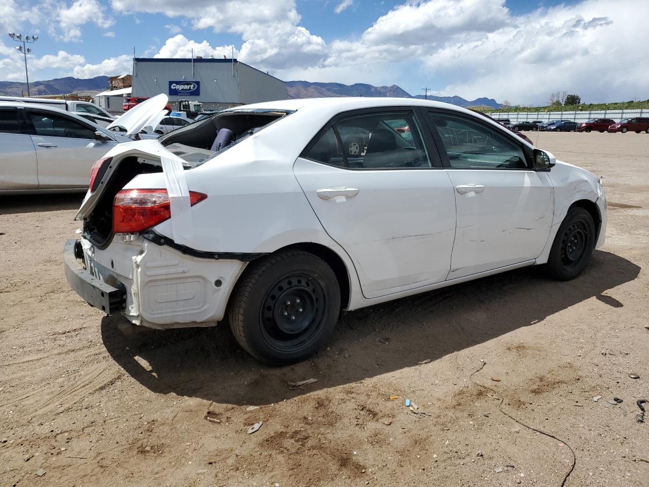 Photo 2 VIN: 5YFBURHE0KP898349 - TOYOTA COROLLA 