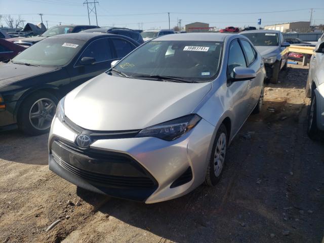 Photo 1 VIN: 5YFBURHE0KP899114 - TOYOTA COROLLA L 