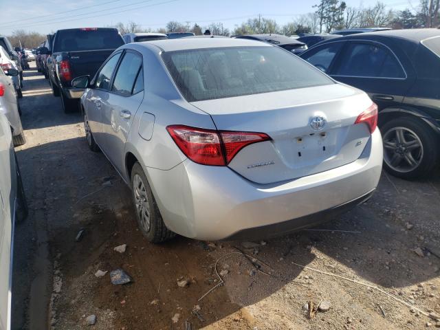 Photo 2 VIN: 5YFBURHE0KP899114 - TOYOTA COROLLA L 