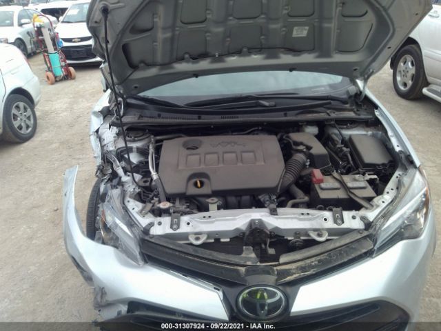 Photo 9 VIN: 5YFBURHE0KP902268 - TOYOTA COROLLA 