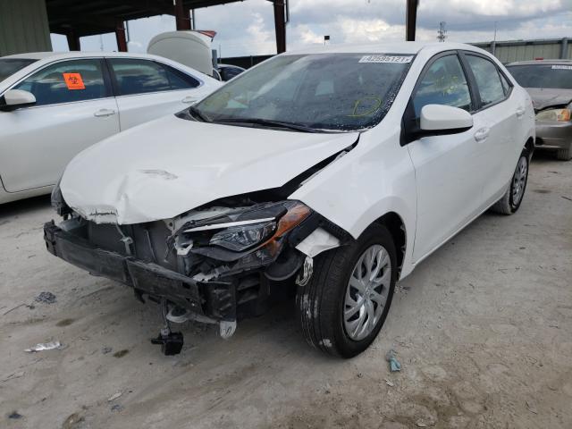 Photo 1 VIN: 5YFBURHE0KP904862 - TOYOTA COROLLA L 