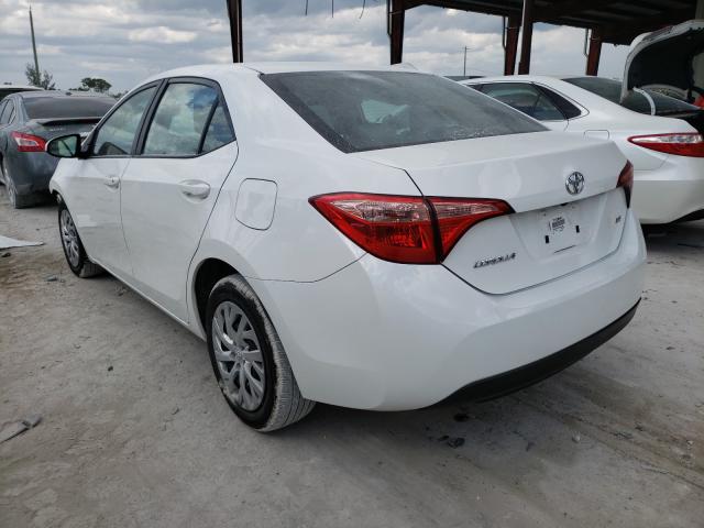 Photo 2 VIN: 5YFBURHE0KP904862 - TOYOTA COROLLA L 