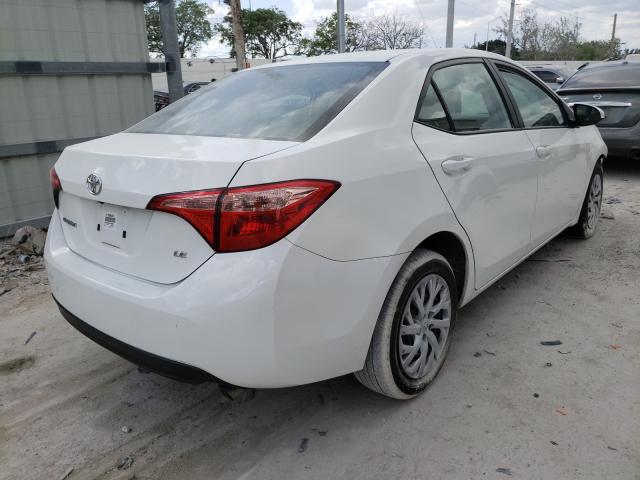 Photo 3 VIN: 5YFBURHE0KP904862 - TOYOTA COROLLA L 