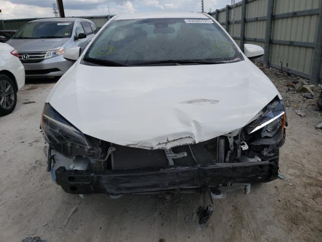 Photo 8 VIN: 5YFBURHE0KP904862 - TOYOTA COROLLA L 