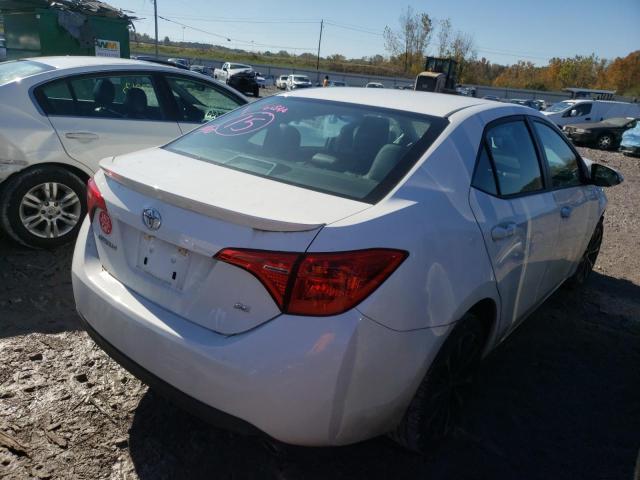 Photo 3 VIN: 5YFBURHE0KP906191 - TOYOTA COROLLA L 