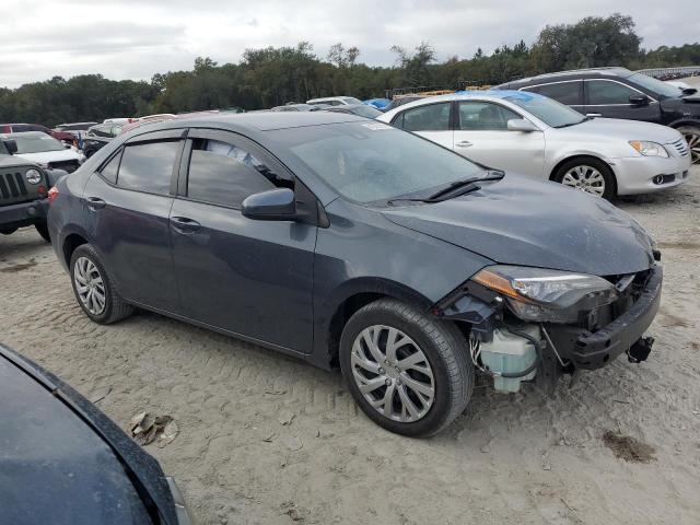 Photo 3 VIN: 5YFBURHE0KP907924 - TOYOTA COROLLA L 